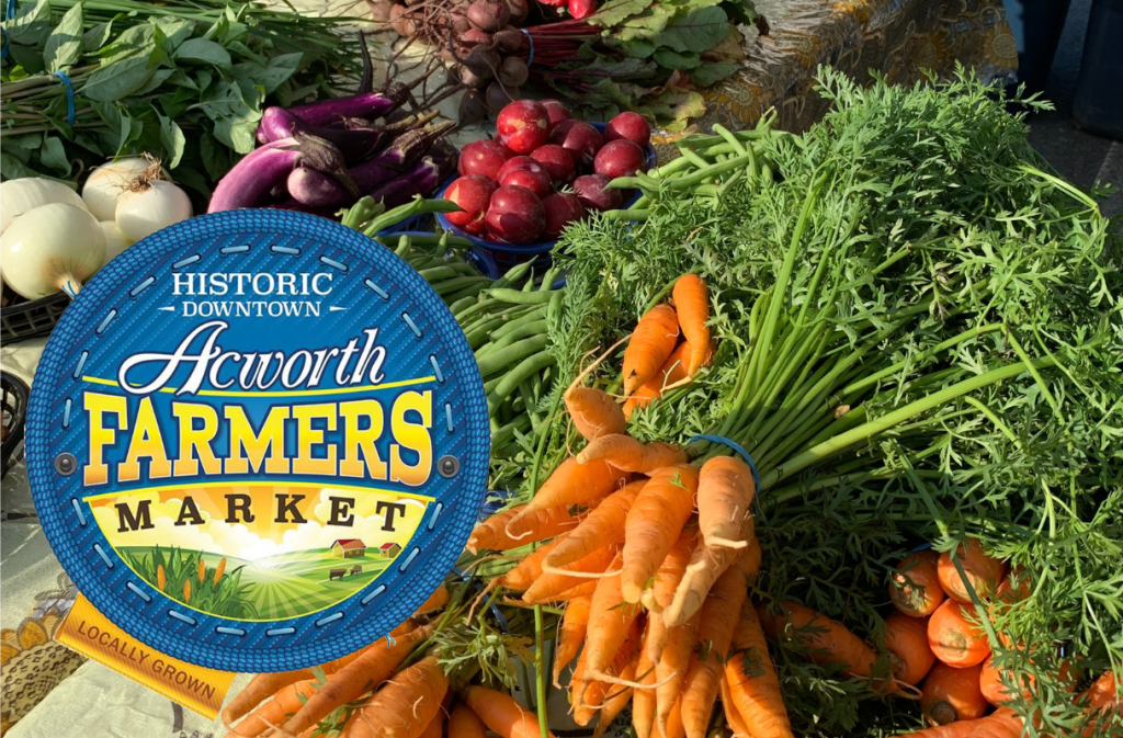Image Acworth Farmers Market Logo with Fresh Vegetables in Background