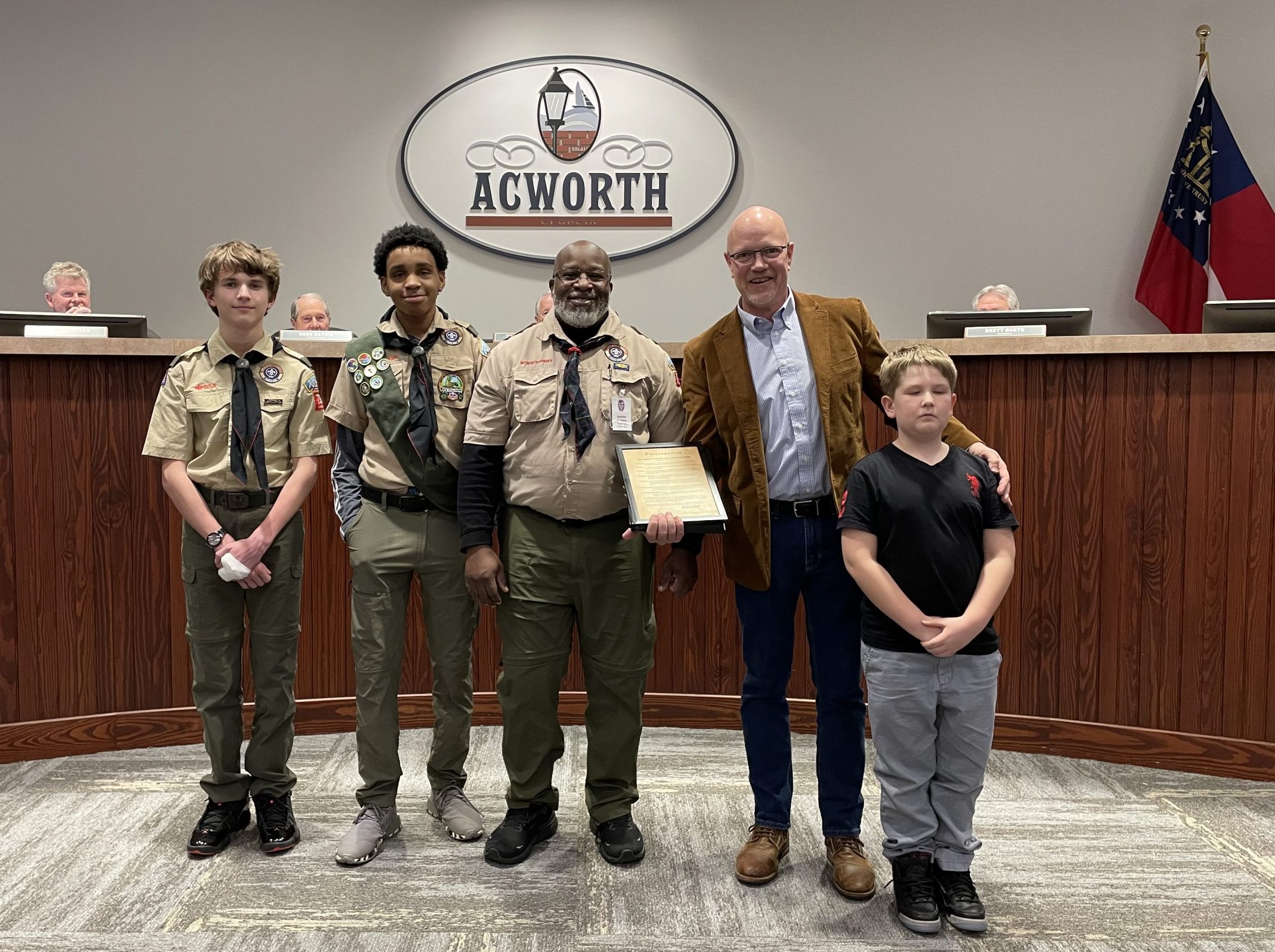 Image Alderman Toby Carmichael with Boy Scouts Presenting Proclamation