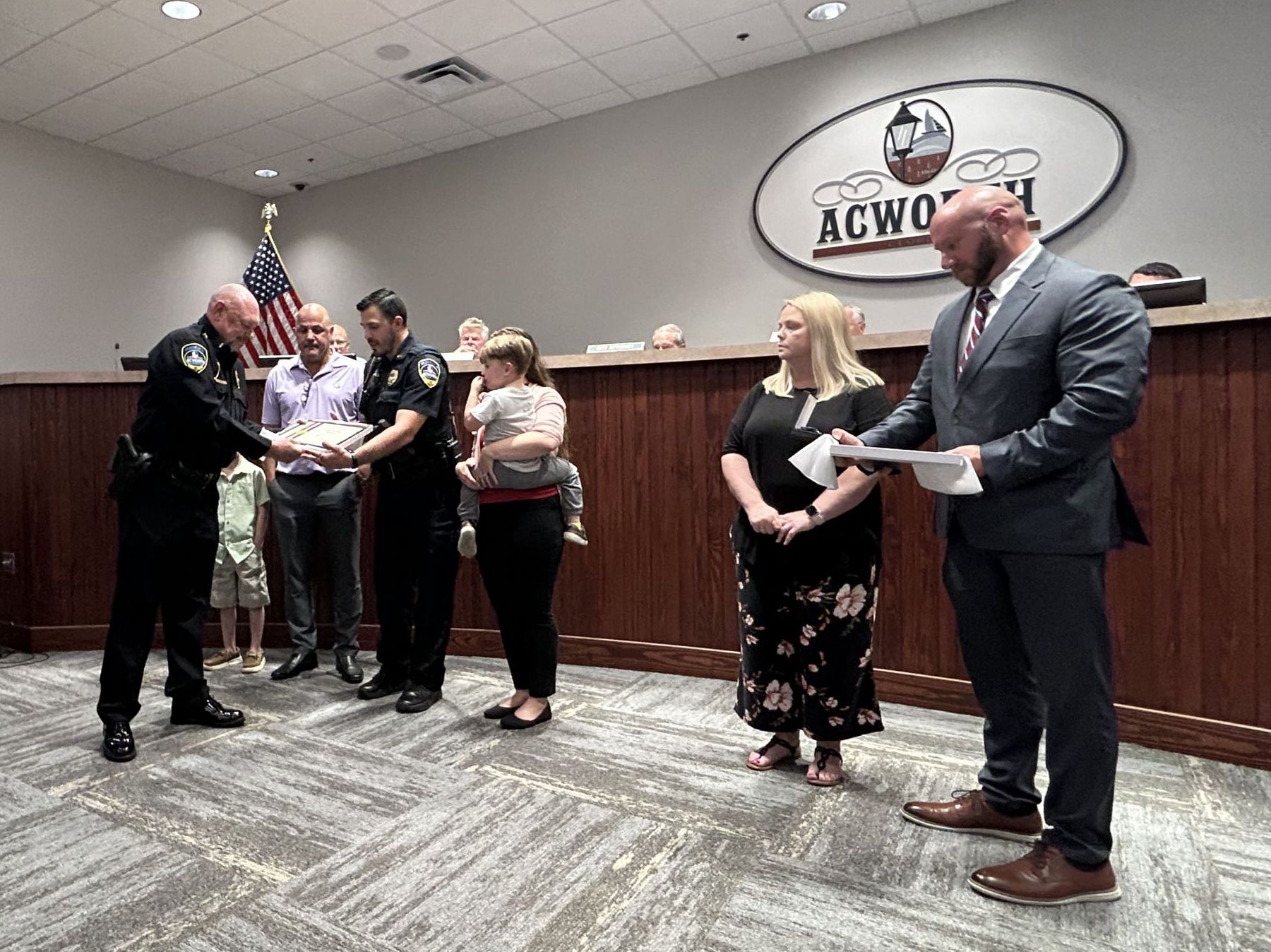 Image Detective Hardy and Officer Salone Accepting Lifesaving Awards at Acworth City Council Meeting