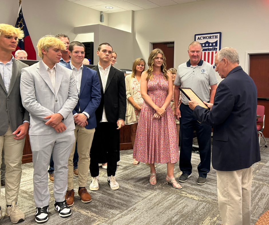 Image North Cobb Christian School Athletes Accepting Proclamation from Mayor Tommy Allegood