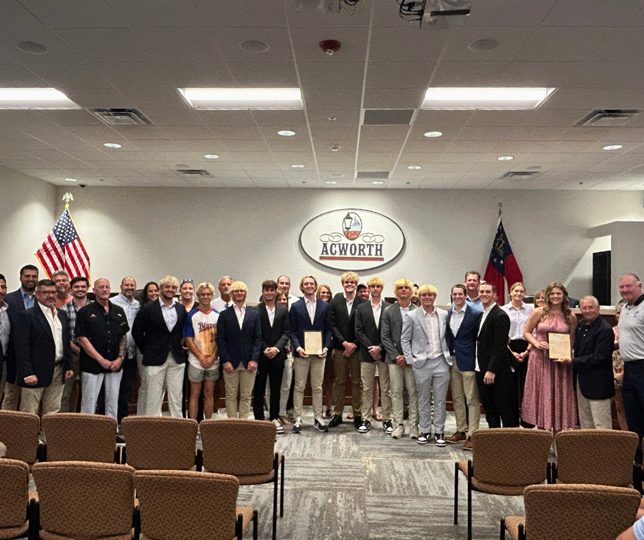 Image Christina Surcey and Other North Cobb Christian School Athletes Accepting Proclamation from Mayor Tommy Allegood 