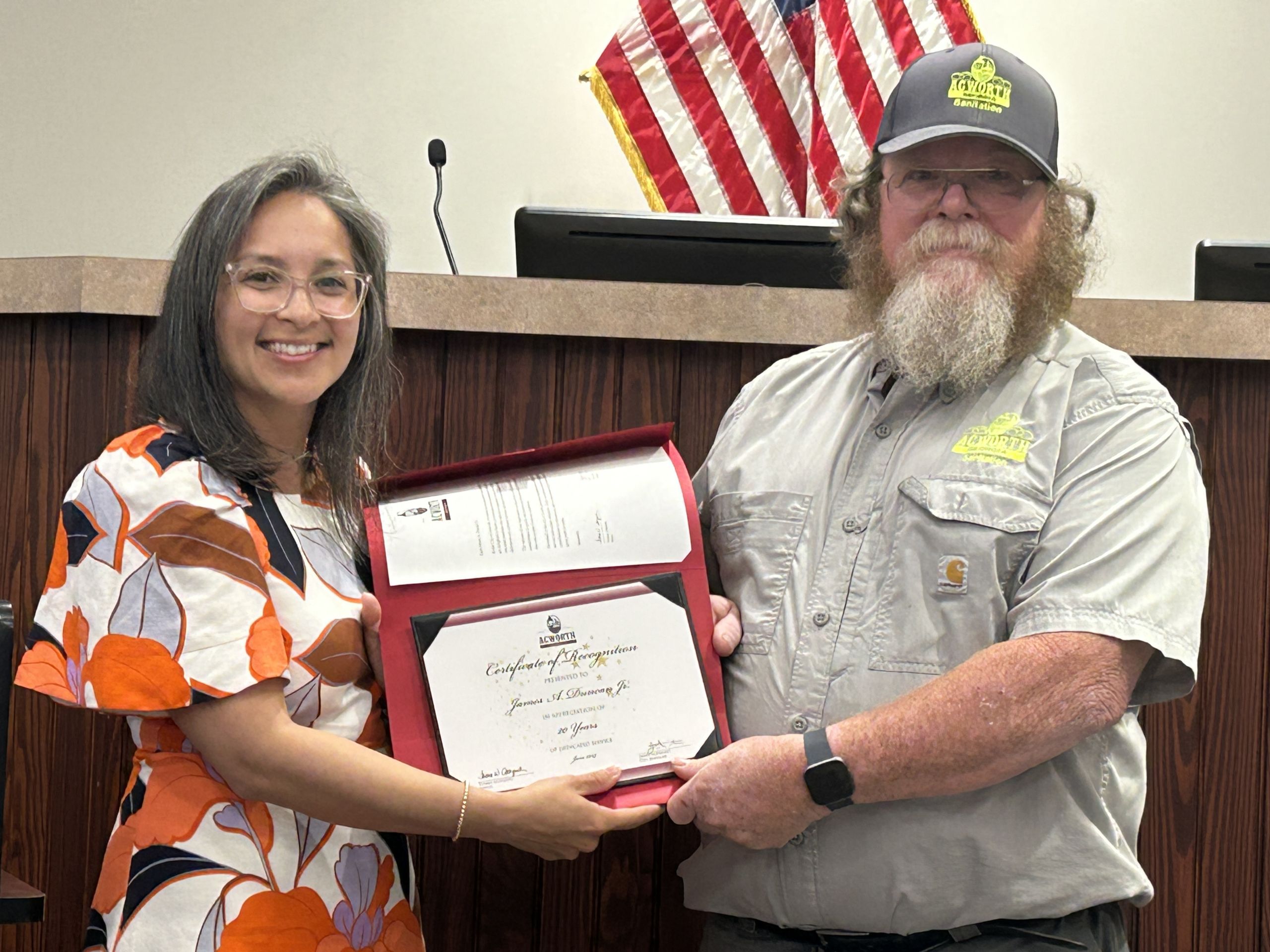 Image Angie Luna with Jimmy Duncan at his city council meeting recognition for 20 years serving the City of Acworth