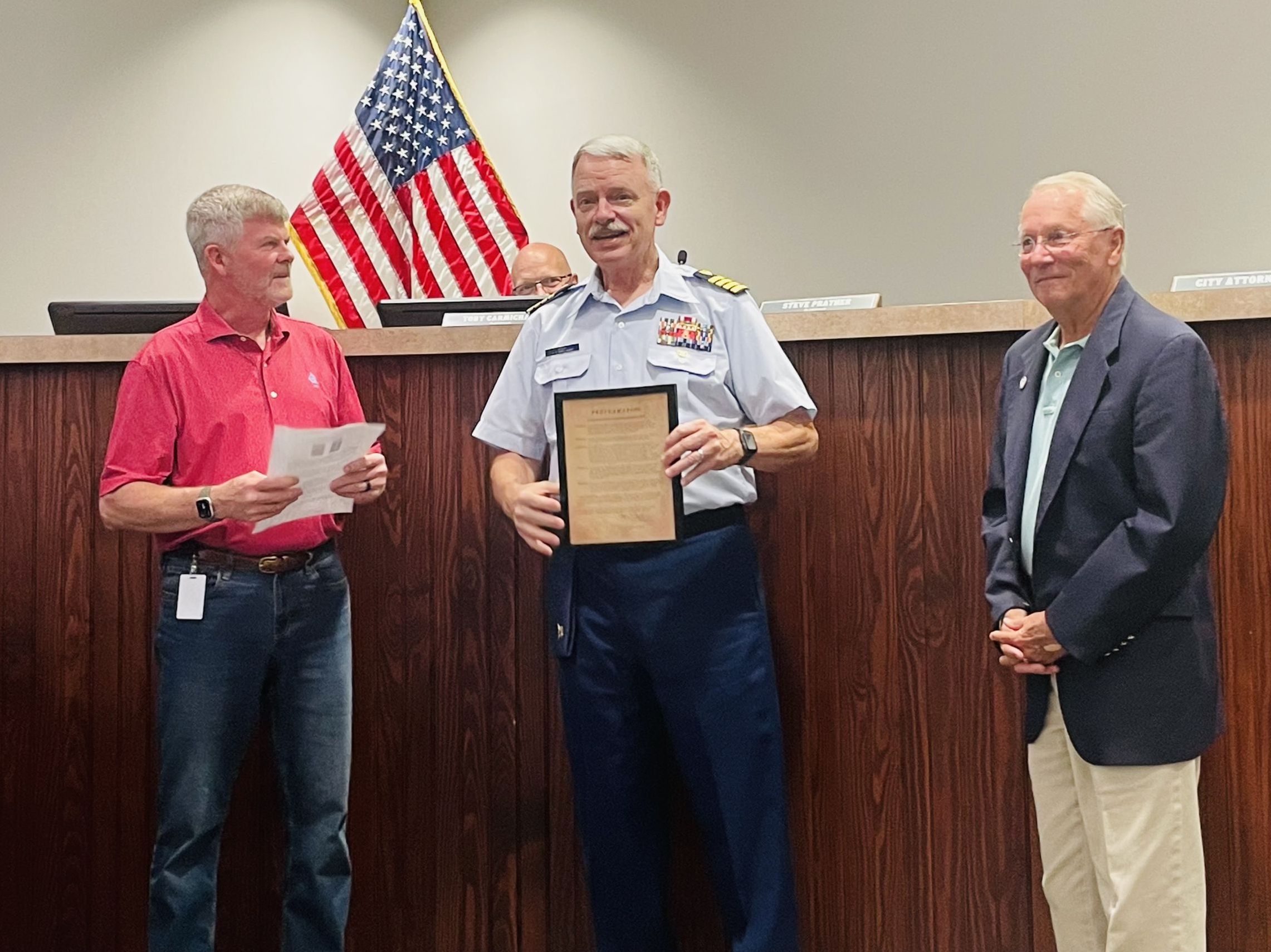 Image of Three Men at Acworth City Council  with Proclamation for Coast Guard Day