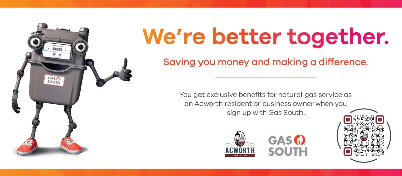 A cartoon gas meter character stands next to text promoting Gas South's benefits for Acworth residents and businesses, with a QR code and logos.