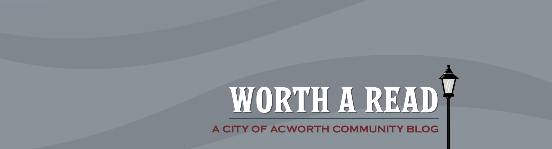 Gray banner with a streetlamp illustration on the right and the text "WORTH A READ" and "A CITY OF ACWORTH COMMUNITY BLOG" on a wavy patterned background.